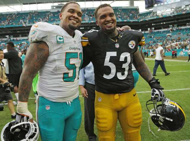 Lynne Sladky/AP/Shutterstock Mike and Maurkice Pouncey