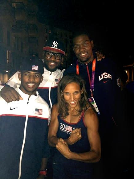 The only girl in the photo flexes as the guys smile & hug.Toughen up @cp3 @kingjames & @kdtrey5 we got medals to win. <a href="http://lockerz.com/s/228515214" rel="nofollow noopener" target="_blank" data-ylk="slk:@lolojones;elm:context_link;itc:0;sec:content-canvas" class="link ">@lolojones</a>