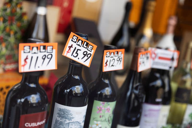 FILE PHOTO: Prices are seen on wine bottles displayed in a store in Manhattan, New York City