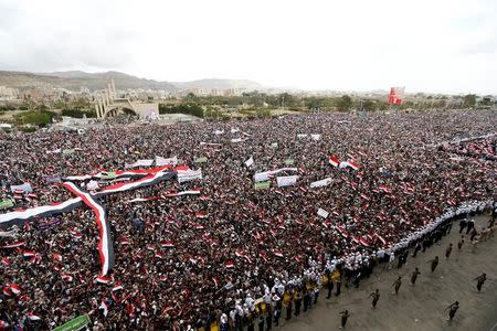 Supporters of the Houthi movement and Yemen's former president Ali Abdullah Saleh attend a joint rally to mark two years of the military intervention by the Saudi-led coalition, in Sanaa, Yemen March 26, 2017. REUTERS/Khaled Abdullah