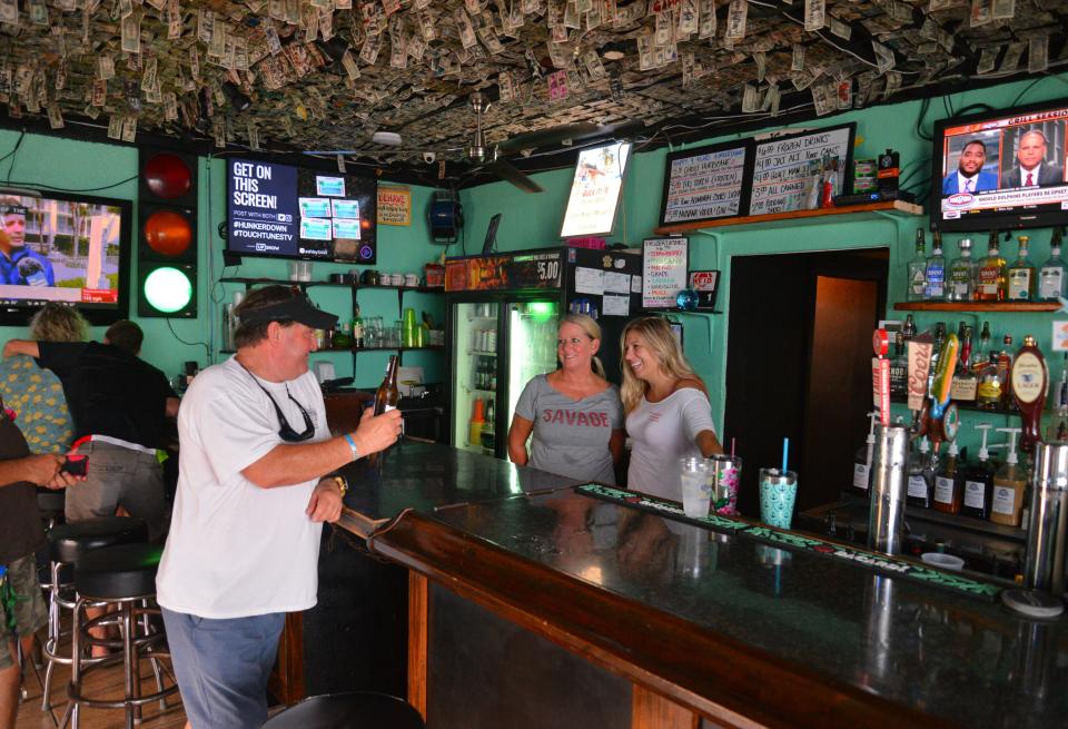 The effects of Hurricane Dorian were starting to be felt on the Space Coast with winds picking up and big surf. Hunkerdown Hideaway, a small beach bar near the end of Minutemen Causeway, known for staying open for locals who don't plan on evacuating, was starting to fill up with regulars Monday morning. 