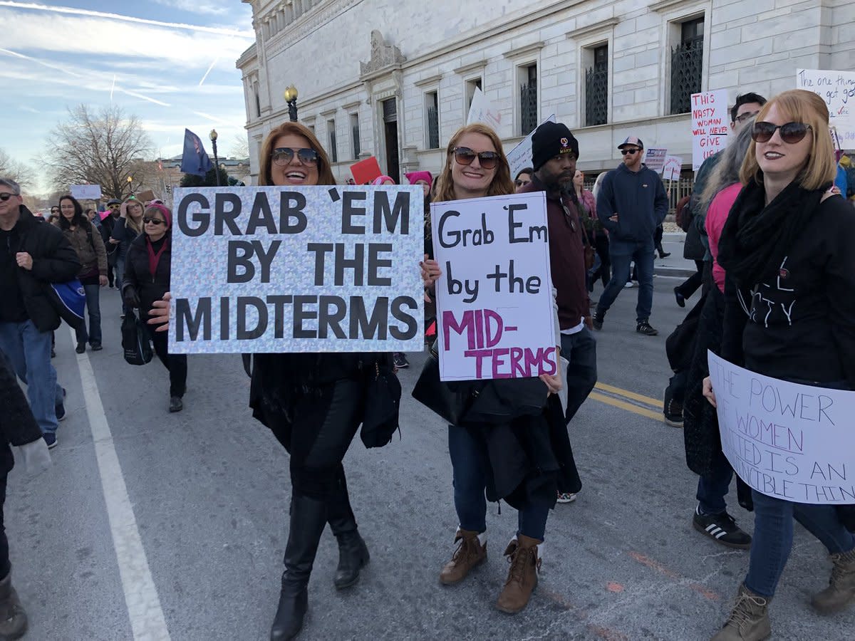 Kristen Floyd, Stephanie Voith and Renee Voith display their sign. (Photo: Garance Franke-Ruta/Yahoo News)