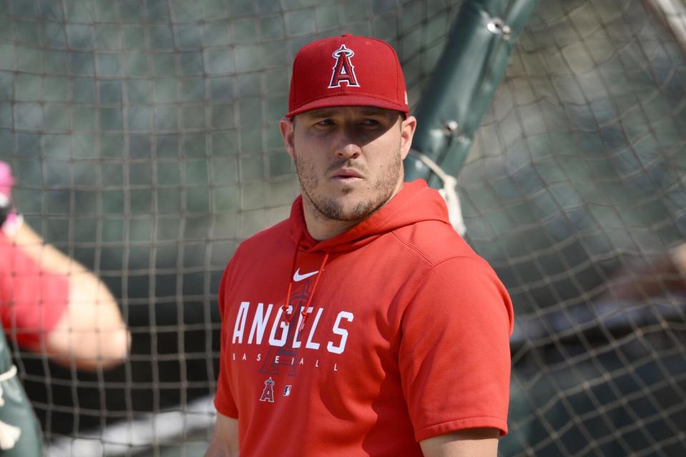 Angels center fielder Mike Trout stands during batting practice before a game.