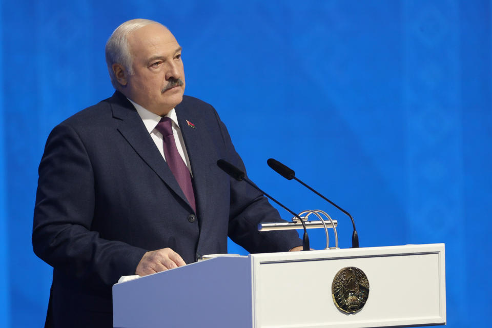 In this photo provided by the Belarusian Presidential Press Service, Belarusian President Alexander Lukashenko delivers a state-of-the nation address in Minsk, Belarus, Friday, March 31, 2023. (Belarusian Presidential Press Service via AP)