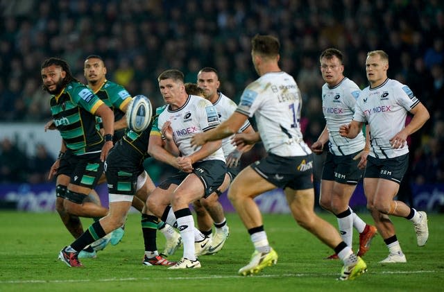 Owen Farrell in the thick of the action against Northampton