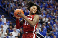 Alabama's John Petty Jr. pulls down a rebound during the second half of an NCAA college basketball game against Kentucky in Lexington, Ky., Saturday, Jan 11, 2020. Kentucky on 76-67. (AP Photo/James Crisp)