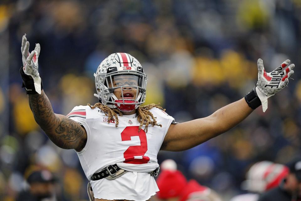 Ohio State Buckeyes defensive end Chase Young (2) gets the Ohio State Buckeyes pumped up during warm ups against  Michigan Wolverines in Ann Arbor, Michigan on November 30, 2019. [Kyle Robertson/Dispatch]

09wlkbkstrgxulp0ntftgtwfnh