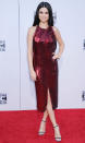 Selena Gomez proved that a red sequin dress isn’t too much and is an idea worth contemplating. [Photo: Rex]