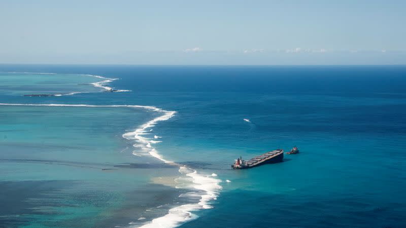 A general view shows the bulk carrier ship MV Wakashio, that ran aground on a reef, at Riviere des Creoles