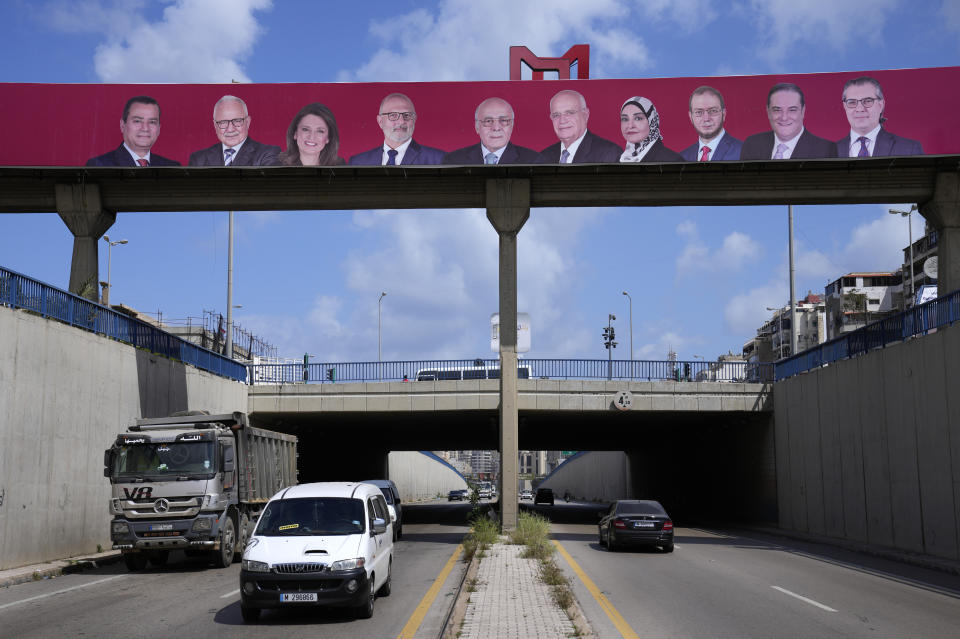 Campaign posters for candidates in the upcoming parliamentary elections adorn a highway, in Beirut, Lebanon, April 12, 2022. The May 15 nationwide vote is the first since Lebanon's economy took a nosedive and an August 2020 explosion at Beirut's port killed more than 200 and destroyed parts of the capital. Lebanon's various disasters have fueled anger at Lebanon's political elite, but few see any hope that elections will dislodge them. (AP Photo/Hussein Malla)