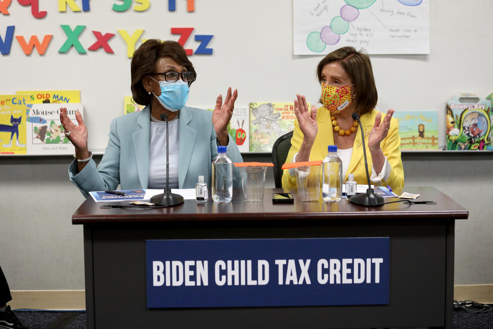 Rep. Waters and House Speaker Pelosi hold a news conference to discuss the importance of the Child Tax Credit Aug. 12, 2021 in Los Angeles. (Gary Coronado/Los Angeles Times via Getty)