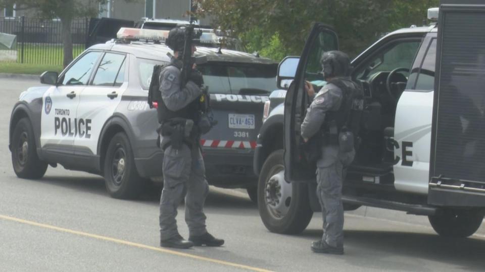 Toronto police's emergency task force, with the help of canine units, cleared the building where the shooting occurred.