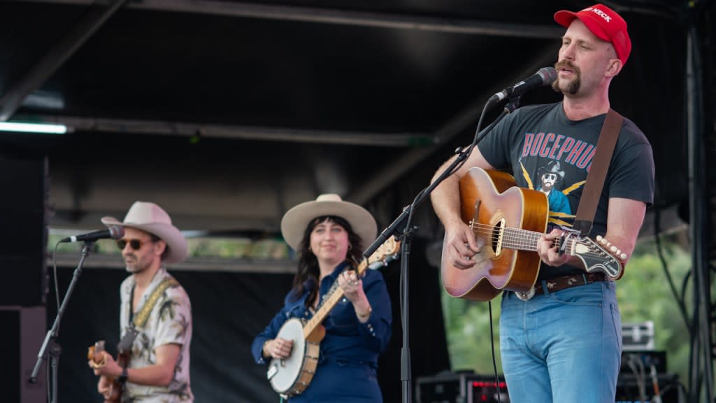 L-R: Leroy Lee, Caitlin Harnett and Andy Golledge of the Andy Golledge Band | Credit: Marc Grimwade/WireImage