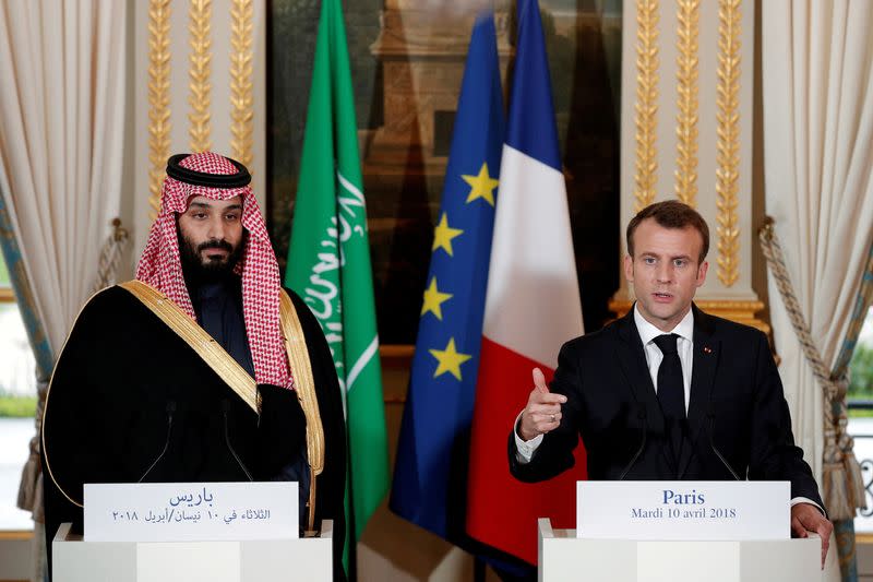 FILE PHOTO: French President Emmanuel Macron and Saudi Arabia's Crown Prince Mohammed bin Salman attend a press conference at the Elysee Palace in Paris