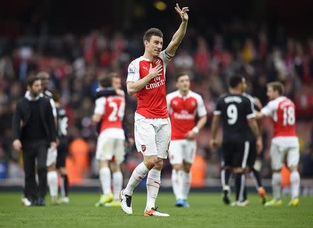 Football Soccer - Arsenal v Watford - Barclays Premier League - Emirates Stadium - 2/4/16. Arsenal's Laurent Koscielny celebrates after the game. Reuters/Dylan Martinez/Livepic