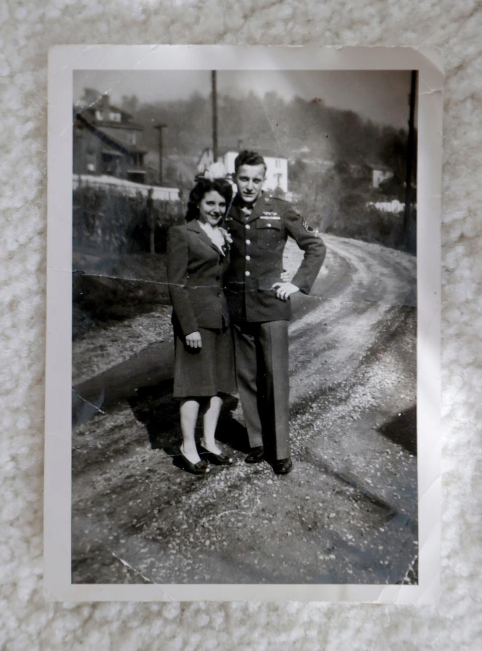 Delphine Klaput with her husband George who served in World War II in a family picture she keeps at her home on Wednesday, November 15, 2023. This image was taken in Freeport, Pennsylvania on October 17, 1944, the day after they were married. Klaput who is 98, is one of many women still living who were known as a Rosie the Riveter during World War II. She worked at Glenn L. Martin Company, an aircraft business in Maryland and carried and moved from one department to another top secret plans and blueprints of various kinds of airplanes during the war.