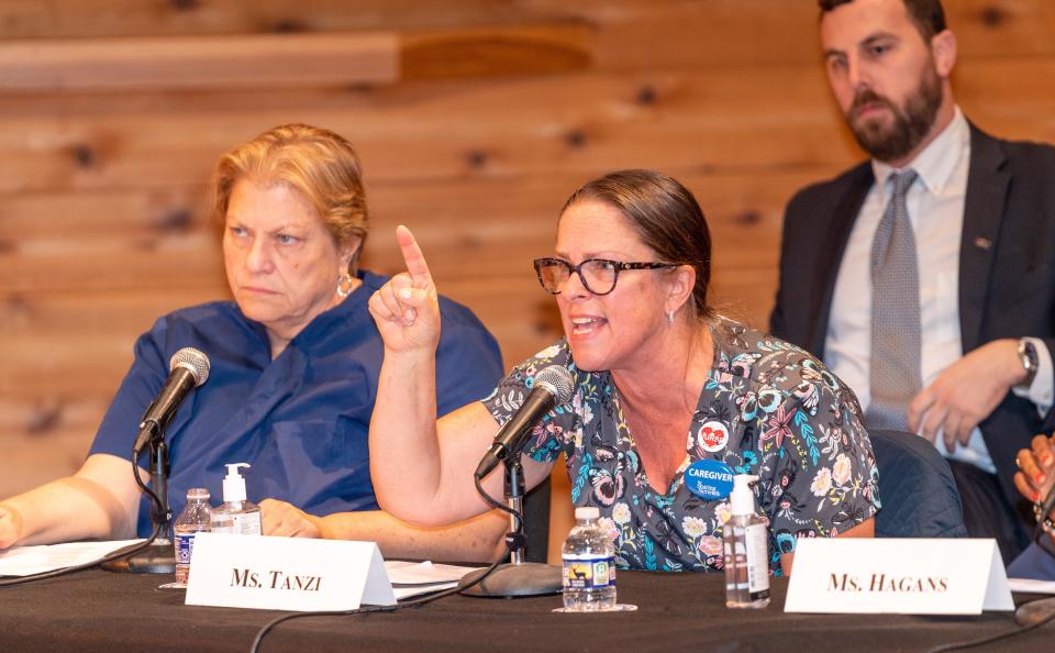 Carol Tanzi, a pediatric recovery room nurse at Robert Wood Johnson University Hospital, speaks during a field hearing on hospital staffing Friday at Rutgers.