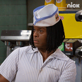 Kel as Ed in "Good Burger" blinking his eyes and taken aback