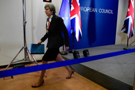 Britain's Prime Minister Theresa May leaves a news conference during the EU Summit in Brussels, Belgium, March 9, 2017. REUTERS/Dylan Martinez