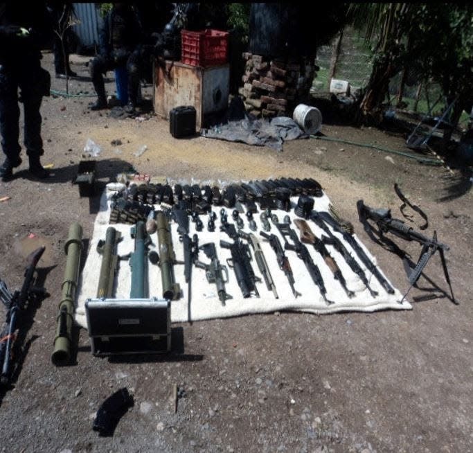 Weapons seized at the compound in rural Jalisco, where El Mencho narrowly escaped. Information from a Gulfport, Mississippi case led to the raid in 2012.