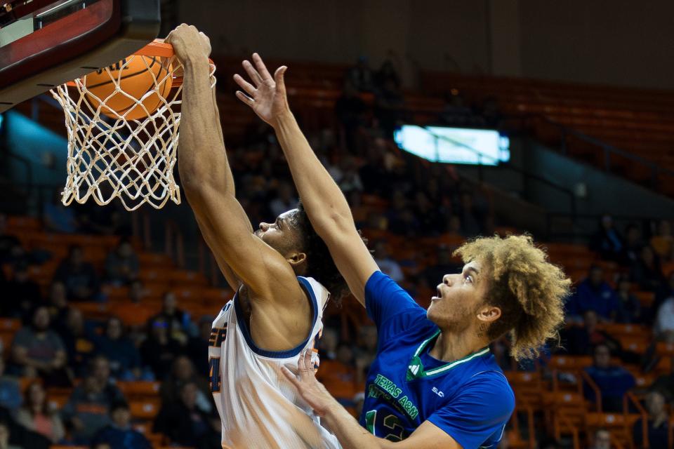 UTEP's Calvin Solomon (13) dunks the ball at a men's basketball game against Texas A&M Corpus Christi on Wednesday, Nov. 29, 2023, at the Don Haskins Center in El Paso, Texas.