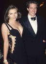 <br>Liz Hurley was unknown when she walked the red carpet with boyfriend Hugh Grant at the premiere of <i>Four Weddings and a Funeral</i> in 1994 wearing <i>that</i> Versace gown.<br><br> Hugh's fame soared after the film's success as did Liz's and they quickly became Britian's new IT couple. <br><br>However it all turned sour when Hugh was arrested for lewd conduct after he was caught with prostitute Divine Brown in Los Angeles in 1995.<br><br>Despite this, the pair remained together until finally splitting in 2000. <br><br>Liz and Hugh still remain firm friends - Hugh is even godfather to her son Damien, whom she had with ex, Steve Bing.<br><br>Liz was most recently engaged to Aussie cricketer Shane Warne however they split up in 2013. <br><br><b><a rel="nofollow" href="https://au.lifestyle.yahoo.com/new-idea/news/star-watch/" data-ylk="slk:CLICK HERE FOR THE LATEST CELEBRITY NEWS!;elm:context_link;itc:0;sec:content-canvas" class="link ">CLICK HERE FOR THE LATEST CELEBRITY NEWS!</a><b> <br><br></b></b>