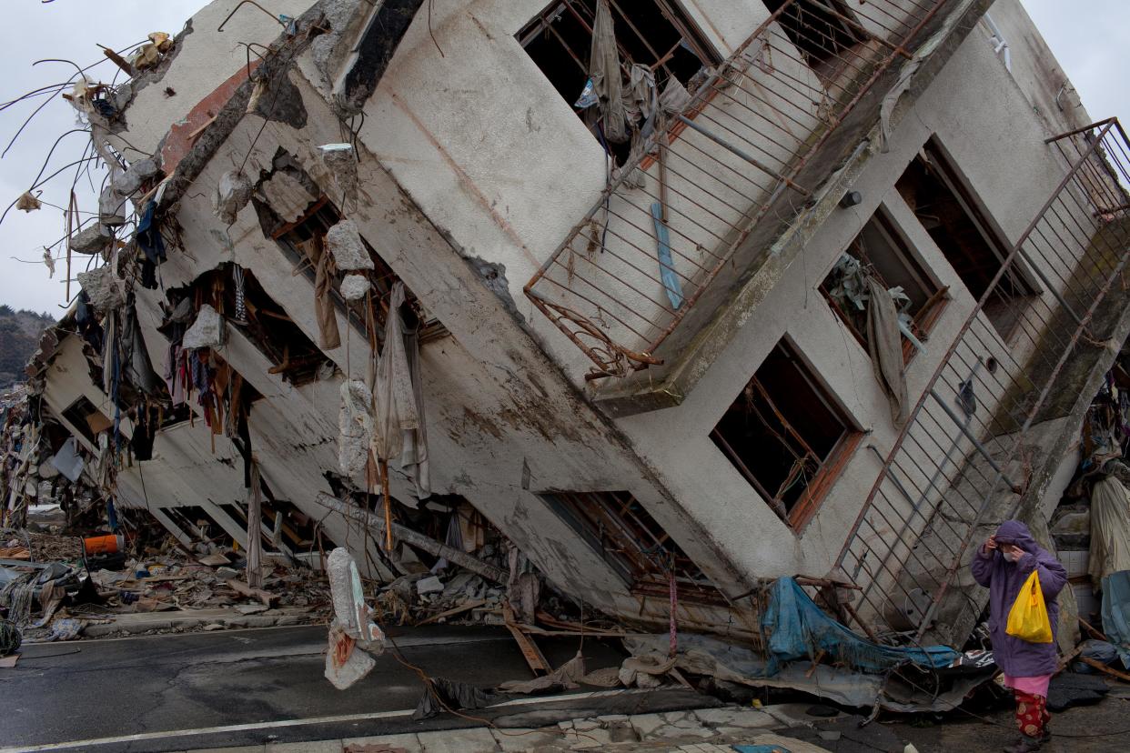 <p>A destroyed building, moved by the tsunami in  Japan’s Miyagi prefecture in 2011</p> (Getty Images)