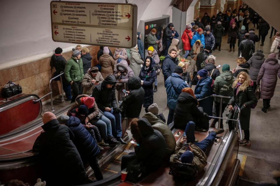 People shelter in an underground station in Kyiv (Getty)