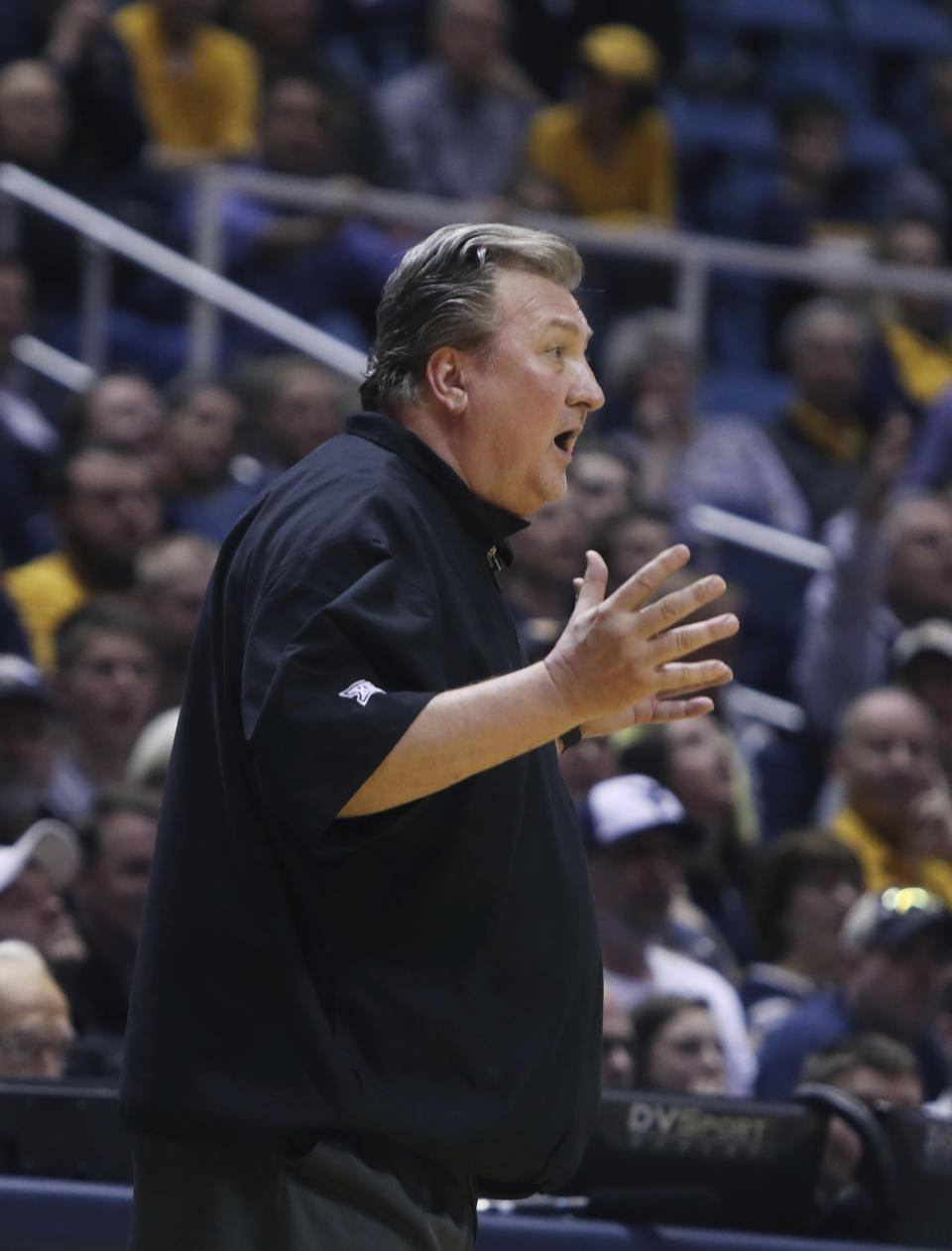 West Virginia head coach Bob Huggins reacts to a referee call during the second half of an NCAA college basketball game against Texas, Monday, Feb. 20, 2017, in Morgantown, W.Va. West Virginia defeated Texas 77-62. (AP Photo/Raymond Thompson)