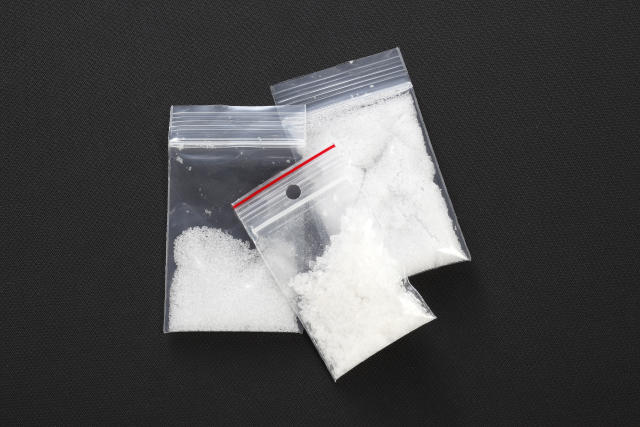Packets containing crystalline substance. 