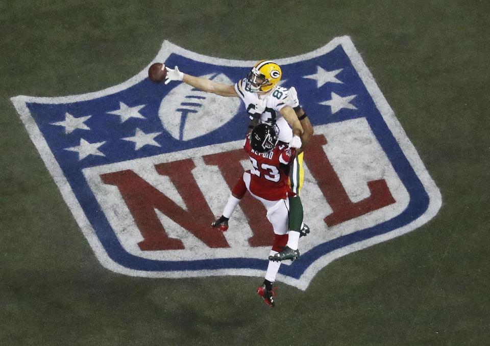 Green Bay Packers wide receiver Jeff Janis (83) is interfered with by Atlanta Falcons cornerback Robert Alford (23) during the second half of the NFL football NFC championship game Sunday, Jan. 22, 2017, in Atlanta. The Falcons won 44-21 to advance to Super Bowl LI. (AP Photo/John Bazemore)