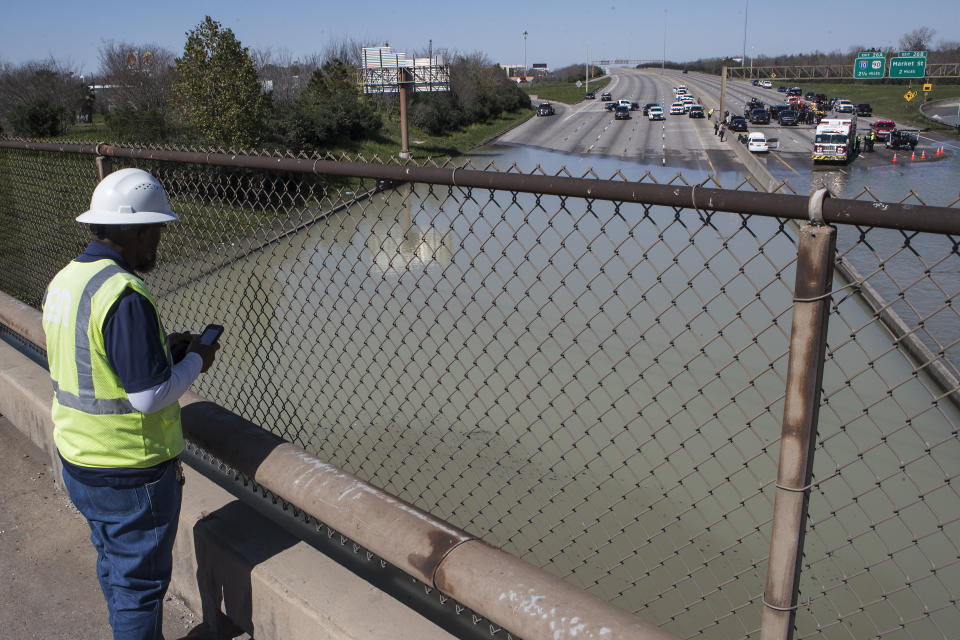 High water from a water main break floods the East Loop 610 on Thursday, Feb. 27, 2020 in Houston. The flooding closed the major freeway that circles the city. ( Brett Coomer/Houston Chronicle via AP)