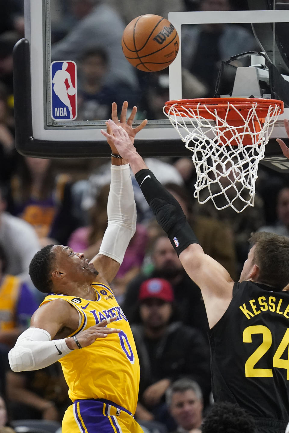 Los Angeles Lakers guard Russell Westbrook (0) shoots as Utah Jazz center Walker Kessler (24) defends during the first half of an NBA basketball game Monday, Nov. 7, 2022, in Salt Lake City. (AP Photo/Rick Bowmer)