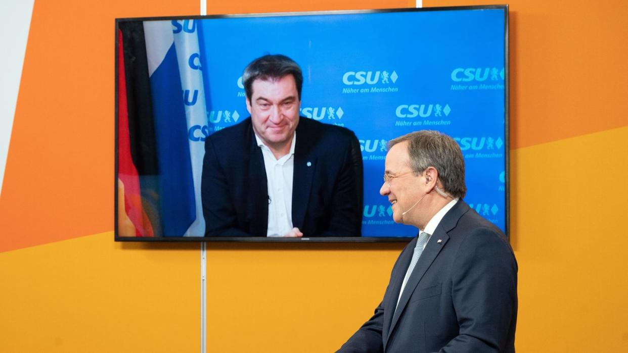 Armin Laschet (r) und Markus Söder beim digitalen Neujahrsempfang der NRW-CDU.