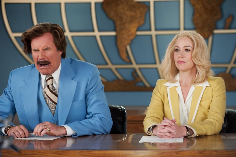 This photo provided by Paramount Pictures shows Will Ferrell, left, as Ron Burgundy and Christina Applegate as Veronica Corningstone, in a scene from the film, "Anchorman 2: The Legend Continues." Paramount Pictures releases the film in the US on Dec. 18, 2013. (AP Photo/Paramount Pictures, Gemma LaMana)