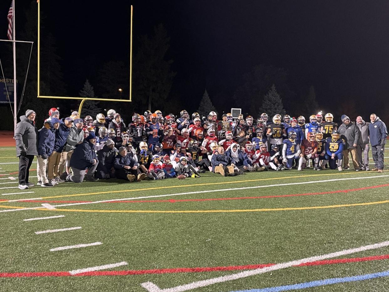 The East team during postgame of the Eddie Meath All-Star Game on Monday, Nov. 20, 2023 at the University of Rochester's Edwin Fauver Stadium. East won 21-6.