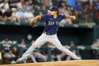 Texas Rangers starting pitcher Dane Dunning throws during the first inning of a baseball game against the Seattle Mariners in Arlington, Texas, Saturday, Aug. 13, 2022. (AP Photo/LM Otero)