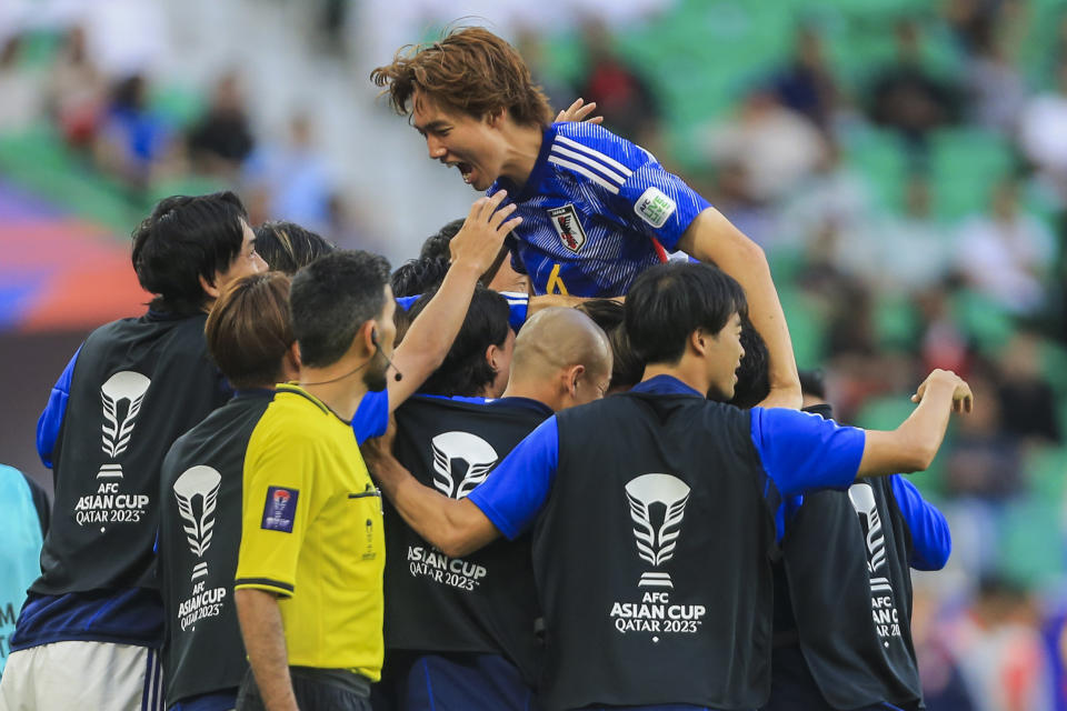 Japan's celebrate their second goal during the Asian Cup round of 16 soccer match between Japan and Bahrain at Al Thumama Stadium in Doha, Qatar, Wednesday, Jan. 31, 2024. (AP Photo/Hussein Sayed)