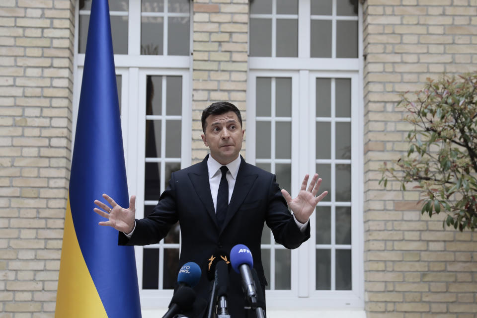 Ukrainian President Volodymyr Zelenskyy holds a press conference at the Ukrainian Embassy to France, Friday, April 16, 2021, in Paris. Ukrainian President Volodymyr Zelenskyy held talks with French President Emmanuel Macron and German Chancellor Angela Merkel amid his country's growing tensions with neighboring Russia, which has deployed troops near its border with Ukraine.(AP Photo/Lewis Joly)