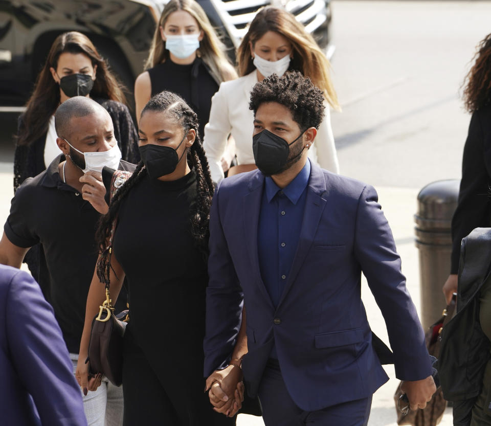 Former “Empire” actor Jussie Smollett, right, arrives the George N. Leighton Criminal Court Building for a hearing on, Wednesday, July 14, 2021 in Chicago (Stacey Wescott/Chicago Tribune via AP)