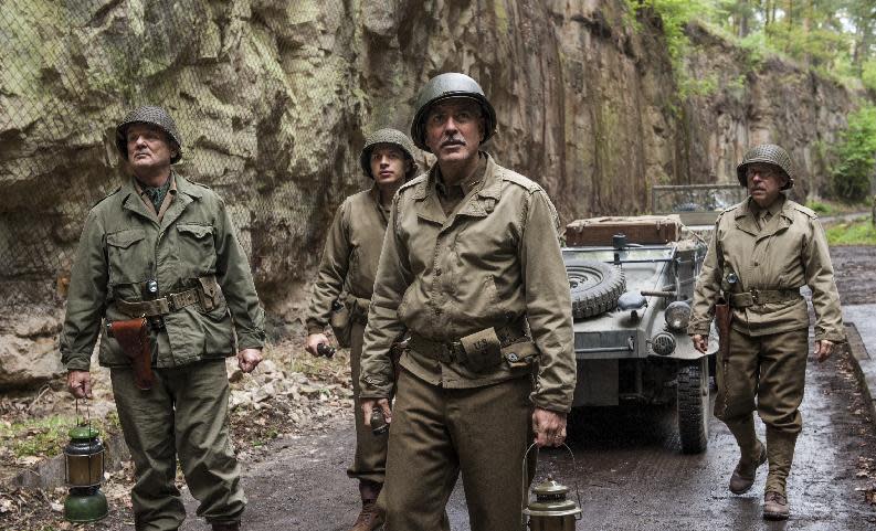 This image released by Columbia Pictures shows, from left, Bill Murray, Dimitri Leonidas, George Clooney and Bob Balaban in "The Monuments Men." (AP Photo/Columbia Pictures, Claudette Barius)