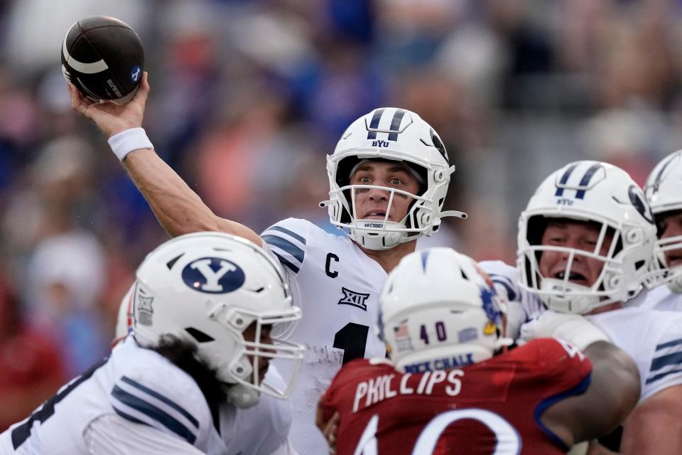 BYU quarterback Kedon Slovis passes the ball in a win against Kansas Saturday in Lawrence, Kansas.