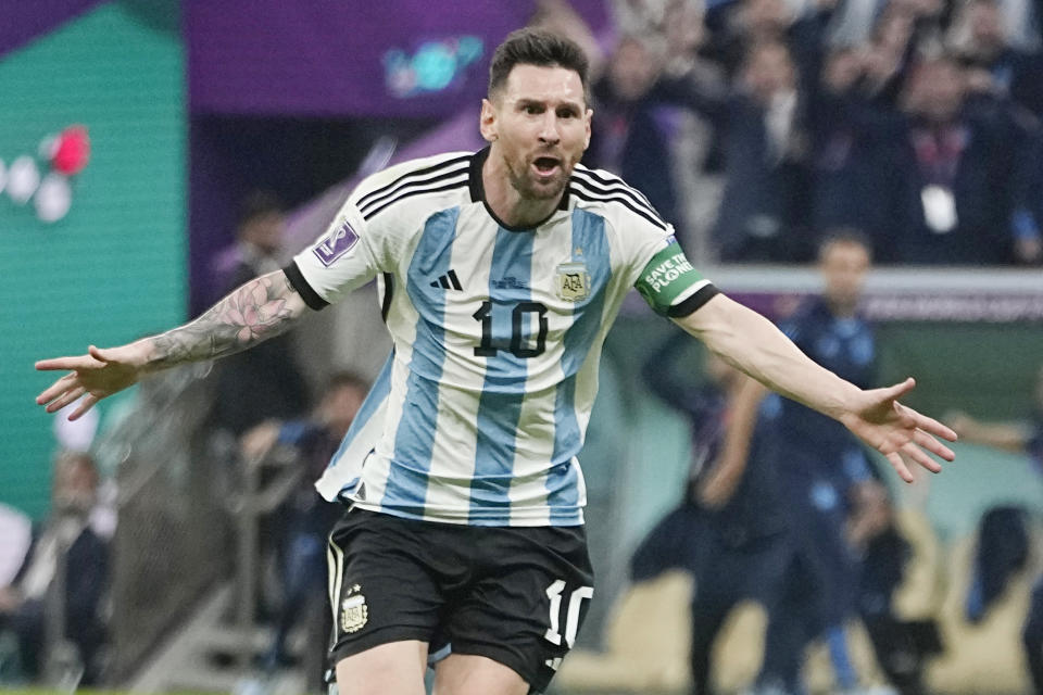 Argentina's Lionel Messi celebrates after scoring his side's opening goal during the World Cup group C soccer match between Argentina and Mexico, at the Lusail Stadium in Lusail, Qatar, Saturday, Nov. 26, 2022. (AP Photo/Ariel Schalit)