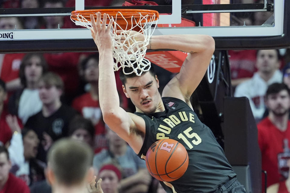 Purdue center Zach Edey dunks in the second half of an NCAA college basketball game against Rutgers , Sunday, Jan. 28, 2024, in Piscataway, N.J. Purdue won 68-60. (AP Photo/Mary Altaffer)