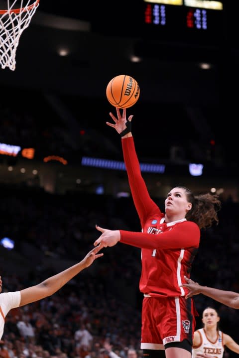 North Carolina State center River Baldwin (1) shoots against Texas during the second half of an Elite Eight college basketball game in the women’s NCAA Tournament, Sunday, March 31, 2024, in Portland, Ore. (AP Photo/Howard Lao)