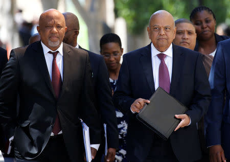 FILE PHOTO: South African Finance Minister Pravin Gordhan and Deputy Finance Minister Mcebisi Jonas arrive for the 2017 Budget Speech at Parliament in Cape Town, South Africa, February 22, 2017. REUTERS/Mike Hutchings/File Photo