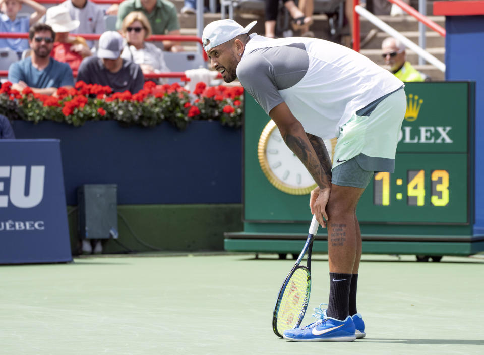 Nick Kyrgios of Australia pauses during his match against Hubert Hurkacz of Poland during the quarterfinals of the National Bank Open tennis tournament on Friday, Aug. 12, 2022, in Montreal. (Paul Chiasson/The Canadian Press via AP)