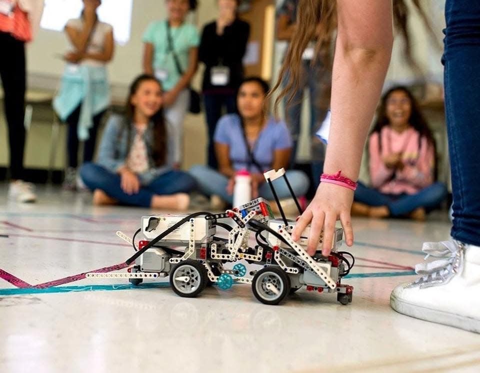 Young women look on at an AAUW Palm Springs STEM camp.