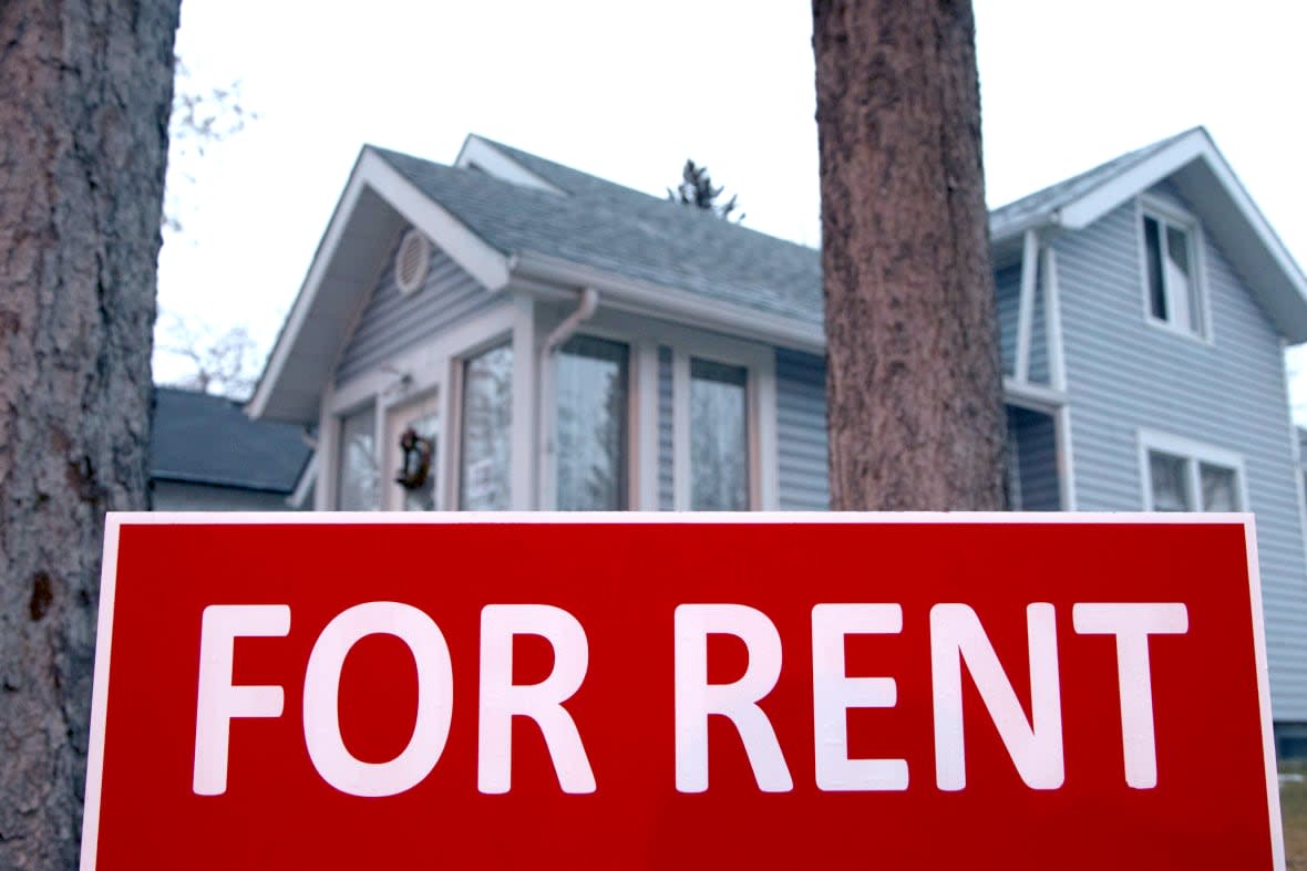 A sign advertises available rental accommodations at a house in Calgary. (Robson Fletcher/CBC - image credit)