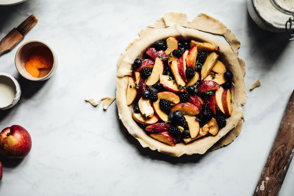 <p>iStock</p><p>Brush the bottom crust with an egg wash to avoid it getting mushy from the overflowing fruit filling.</p><p><strong>Get the recipe: <a href="https://parade.com/29938/sheilalukins/peach-blackberry-pie/" rel="nofollow noopener" target="_blank" data-ylk="slk:Peach-Blackberry Pie;elm:context_link;itc:0;sec:content-canvas" class="link rapid-noclick-resp">Peach-Blackberry Pie</a></strong></p>